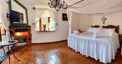 Cama o camas de una habitación en Posada Los Alcatraces