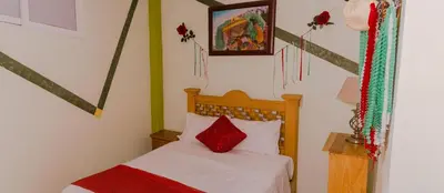 Cama o camas de una habitación en Hotel Carnaval