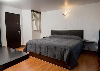 Cama o camas de una habitación en Hotel Central Teziutlan