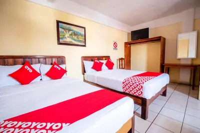 Cama o camas de una habitación en OYO Hotel Betsua Vista Hermosa, Huatulco