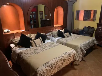 Cama o camas de una habitación en Quinta Maria Bonita Hotel Boutique