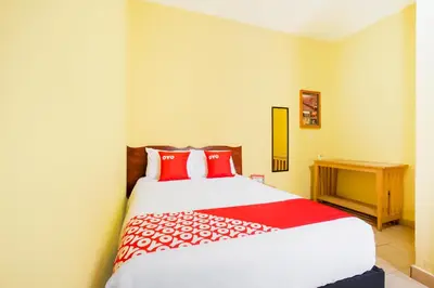 Cama o camas de una habitación en OYO Hotel Y Restaurante Mitla, Oaxaca