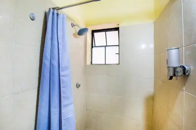 Un baño de OYO Hotel Y Restaurante Mitla, Oaxaca