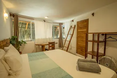Cama o camas de una habitación en Casa Estrella Fugaz Rinconcito Mazunte