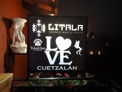 Certificado, premio, señal o documento que está expuesto en Hotel Boutique TEKALI INN