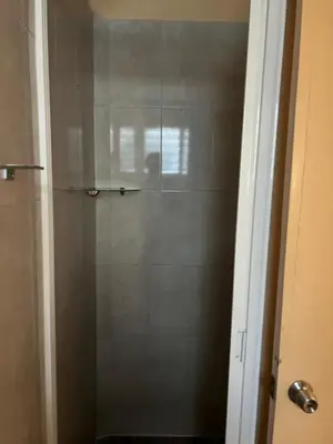 Un baño de Hotel magallanes con cocineta 100 Metros de playa