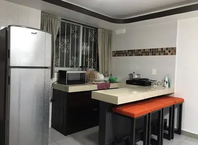 Una cocina o zona de cocina en Hotel magallanes con cocineta 100 Metros de playa