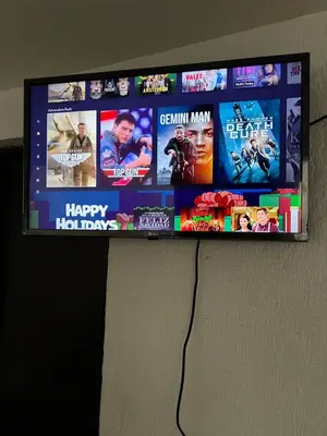 Una televisión o centro de entretenimiento en Hotel magallanes con cocineta 100 Metros de playa