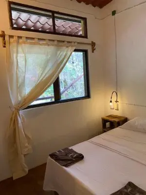Cama o camas de una habitación en HOSTAL CASA DEL ANGEL