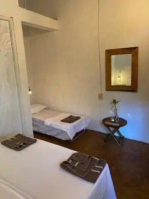 Cama o camas de una habitación en HOSTAL CASA DEL ANGEL
