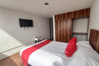 Cama o camas de una habitación en Hotel de Guadalupe