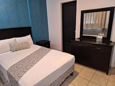 Cama o camas de una habitación en Hotel Costa Verde