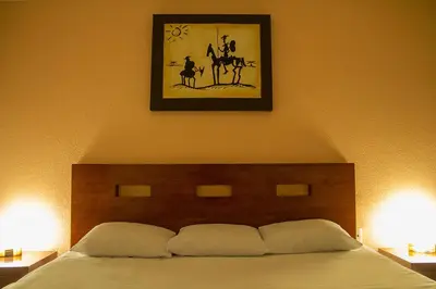 Cama o camas de una habitación en Hotel Posada Santa Bertha