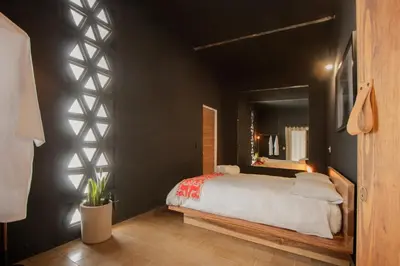 Cama o camas de una habitación en Hotel Sin Nombre