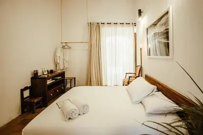 Cama o camas de una habitación en Hotel Sin Nombre