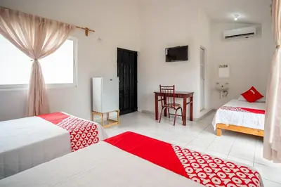 Cama o camas de una habitación en OYO Hotel Posada San Vicente, Huatulco