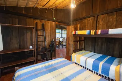 Cama o camas de una habitación en Los Amigos Ecoturismo y Reserva Natural
