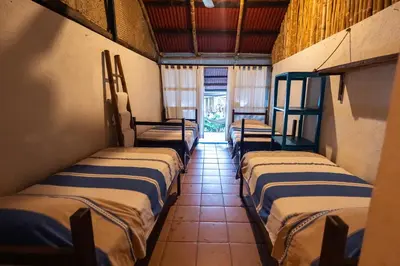Cama o camas de una habitación en Los Amigos Ecoturismo y Reserva Natural
