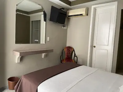 Cama o camas de una habitación en Hotel Rias