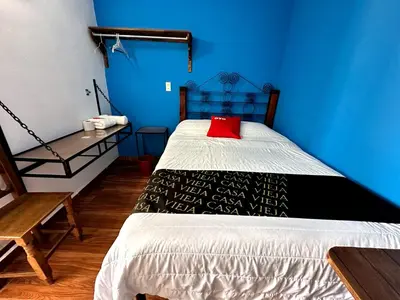 Cama o camas de una habitación en OYO Casa Vieja,Ciudad Serdán,Museo La Magnolia
