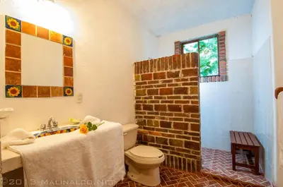 Un baño de Hotel Casa Pomarrosa
