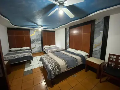 Cama o camas de una habitación en Hotel Puerto México Aeropuerto