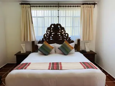 Cama o camas de una habitación en Hotel Spa Posada Tlaltenango