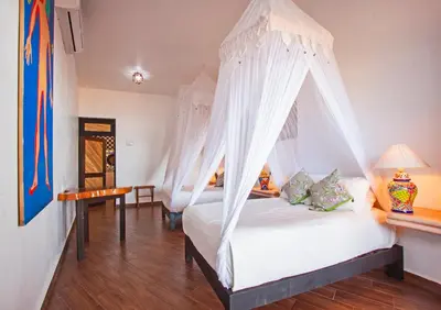 Cama o camas de una habitación en Posada Buda-Tortuga
