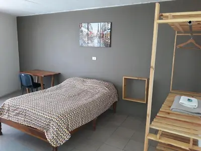 Cama o camas de una habitación en Posada Loreto Xalapa