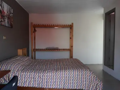 Cama o camas de una habitación en Posada Loreto Xalapa