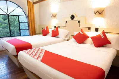 Cama o camas de una habitación en OYO Posada Astrud,Cuetzalan