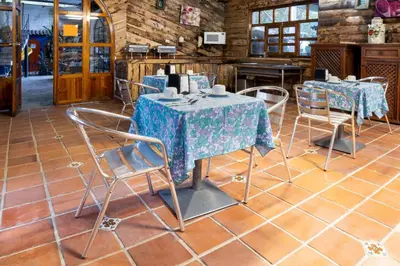 Un restaurante o sitio para comer en OYO Posada Astrud,Cuetzalan