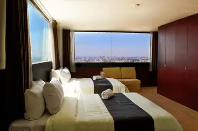 Cama o camas de una habitación en Puebla Inn Express