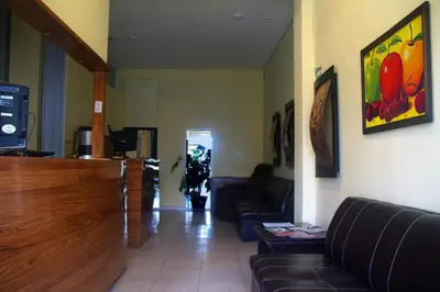 Una televisión o centro de entretenimiento en OYO Hotel Trigos De Oro,San Luis Teolocholco Park