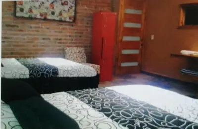 Cama o camas de una habitación en Ex Hacienda Santa Elena