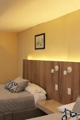 Cama o camas de una habitación en EXECUTIROOMS VERACRUZ