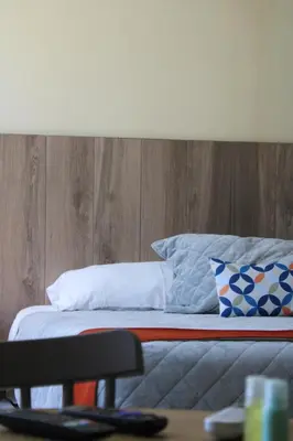 Cama o camas de una habitación en EXECUTIROOMS VERACRUZ