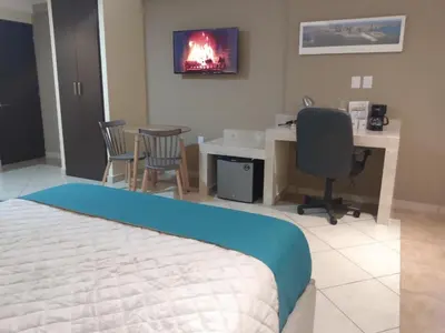Cama o camas de una habitación en EXECUTIROOMS VERACRUZ
