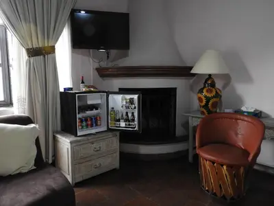 Una televisión o centro de entretenimiento en Villa Bonita Les Terrasses
