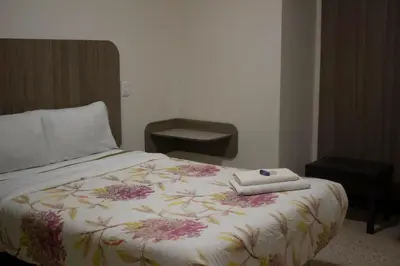 Cama o camas de una habitación en Hotel Winn Comfort