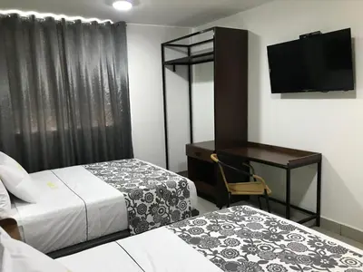 Cama o camas de una habitación en Hotel Jar8 Acuario enfrente al Acuario de Veracruz