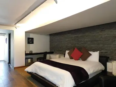 Cama o camas de una habitación en Hotel & Spa Luna Canela Boutique