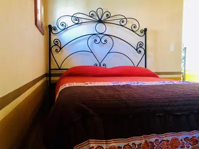 Cama o camas de una habitación en Cabañas el Pajar