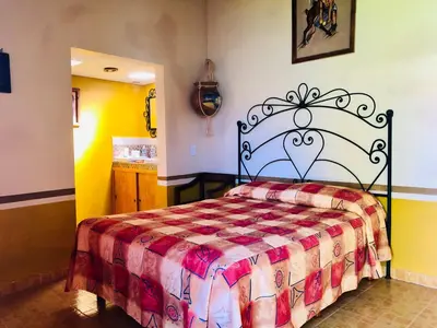 Cama o camas de una habitación en Cabañas el Pajar