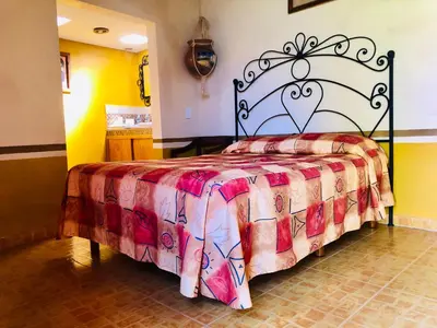 Cama o camas de una habitación en Cabañas el Pajar