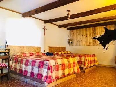 Cama o camas de una habitación en Cabañas el Pajar