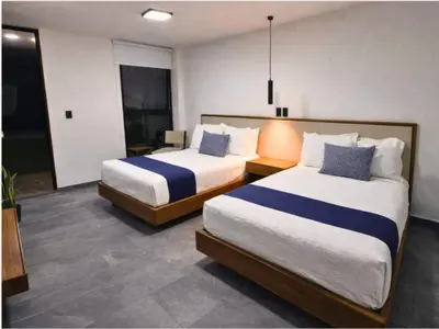 Cama o camas de una habitación en Hotel Ix By San Clemente