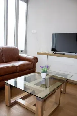 Una televisión o centro de entretenimiento en Condo con Alberca a un Paso del Estadio Azteca