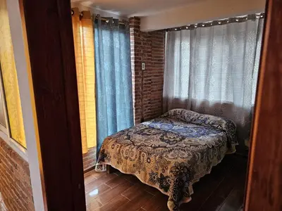 Cama o camas de una habitación en Cabañas Morales