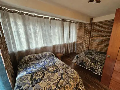 Cama o camas de una habitación en Cabañas Morales